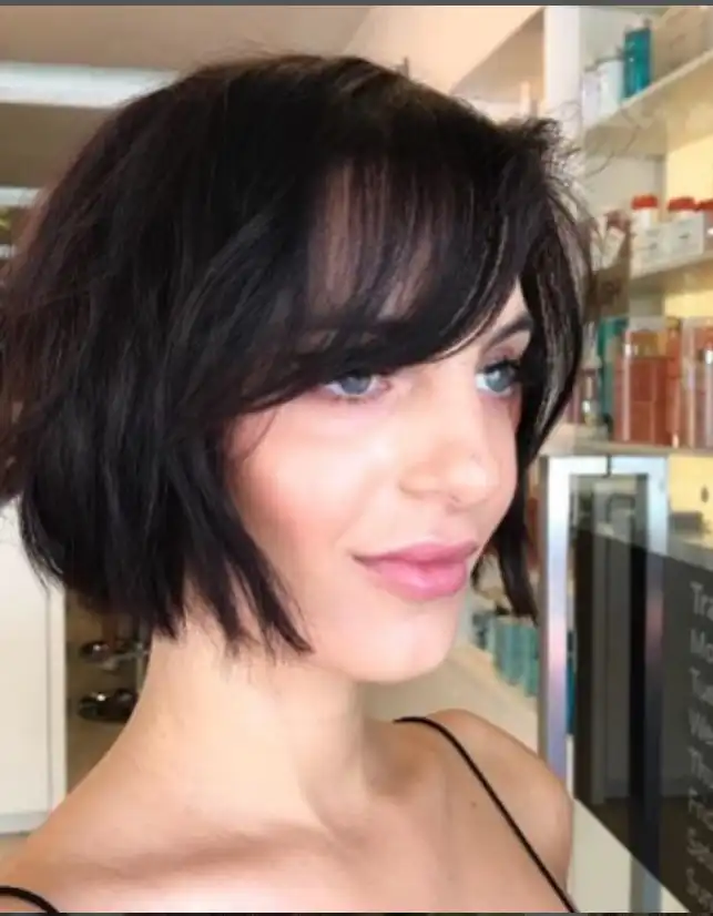 Choppy short bob with side fringe edgy textured hairstyle