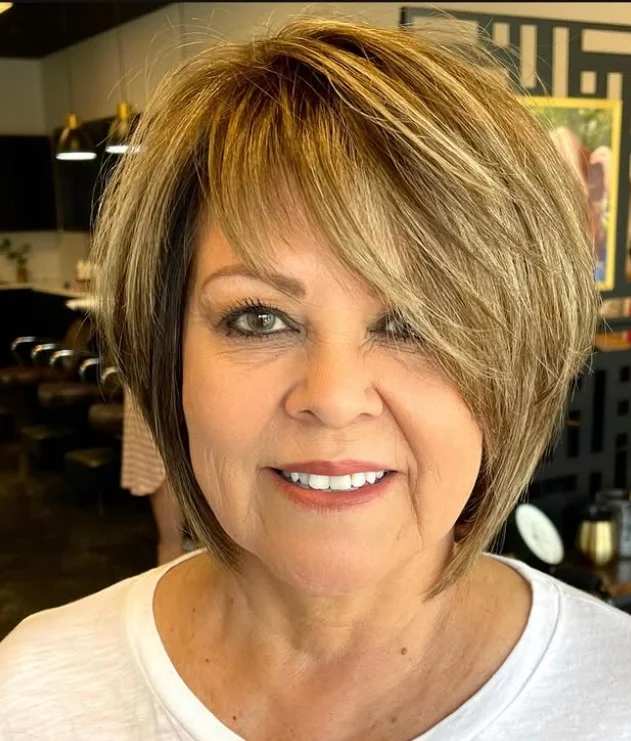 Classic layered bob hairstyle with side bangs soft modern look