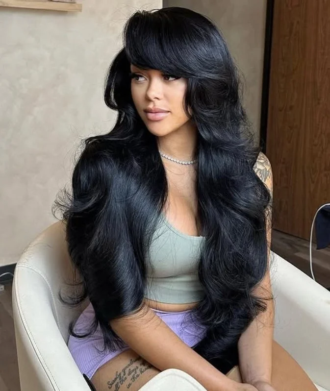 Feathered long layered hairstyle with side bangs airy movement style