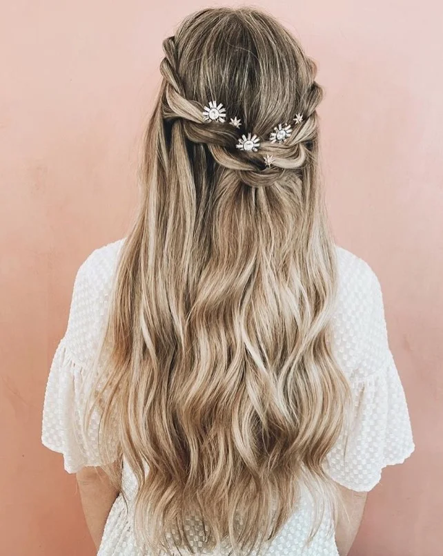 half up braided hairstyle for long beach hair