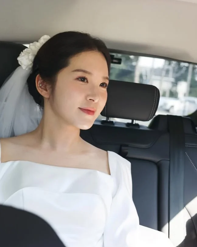 Korean bun hairstyle with wispy curtain bangs elegant soft updo