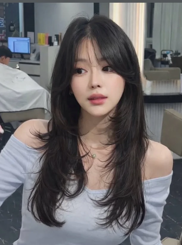 Long hair with korean wispy curtain bangs soft flowing style