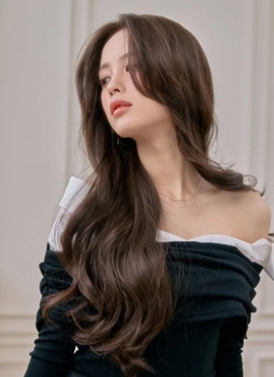Long waves with side bangs soft glamorous hairstyle