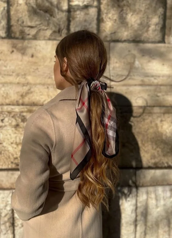 low ponytail with scarf beach hairstyle for long hair