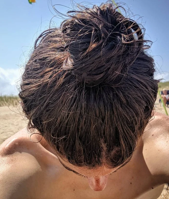 messy bun cute beach hairstyle easy summer style