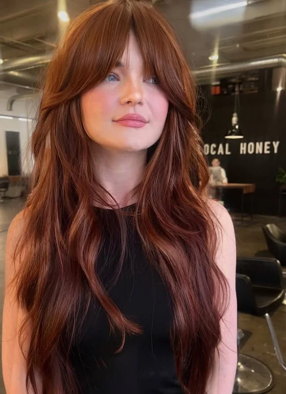 Shag haircut with bangs textured style for long face