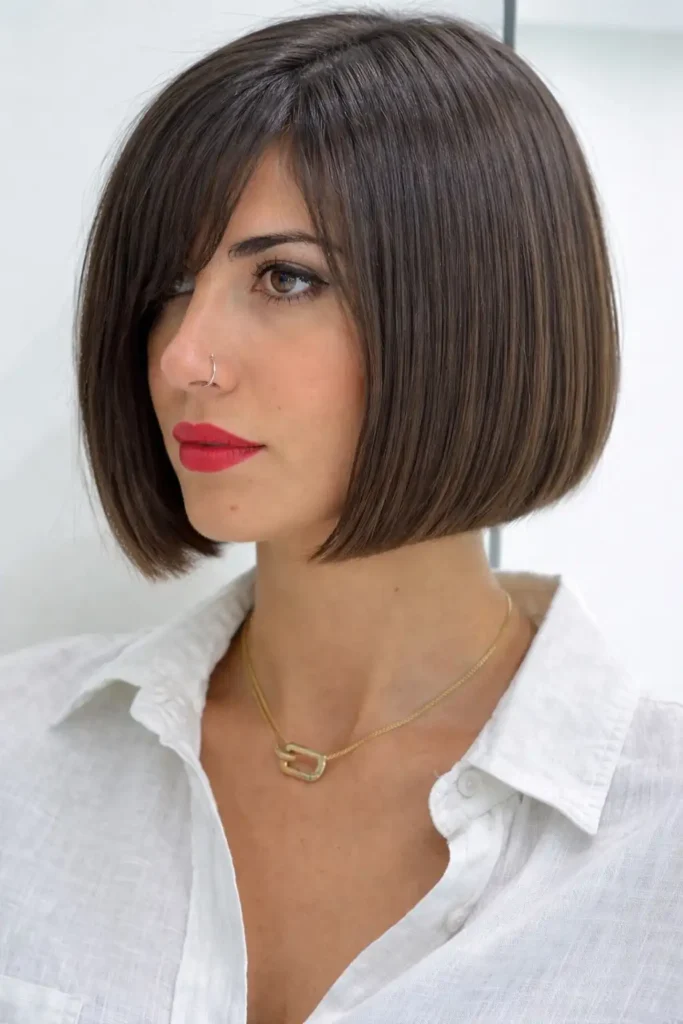 Short straight bob with side bangs sleek clean hairstyle