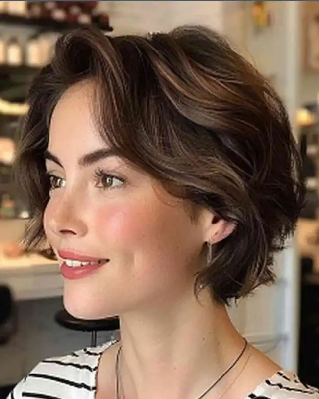 Short wavy hairstyle with side bangs soft natural volume