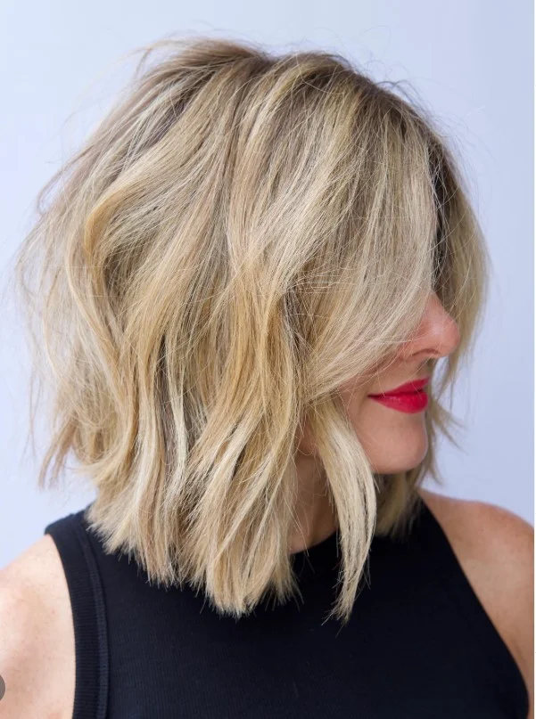 textured lob short beach hairstyle modern look