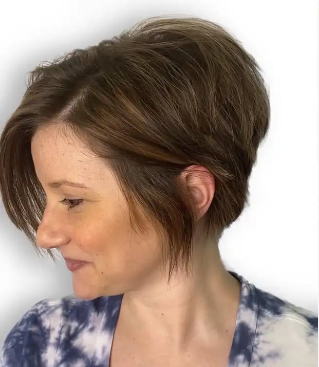 Textured pixie cut with side swept bangs edgy modern hairstyle