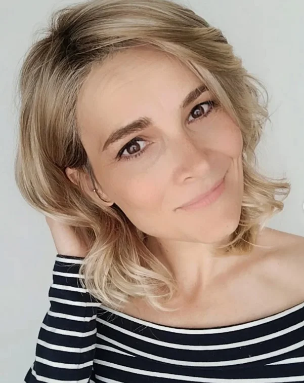 tucked behind ears short beach hairstyle simple clean look