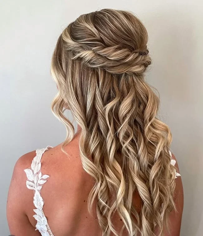 twisted half up cute beach hairstyle soft style