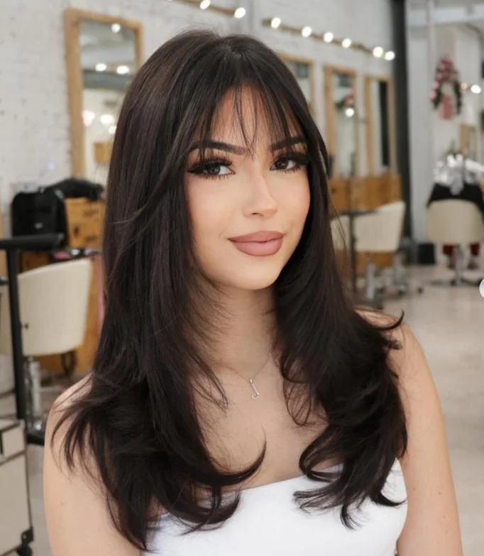 Wispy bangs with medium hairstyle soft look for long face