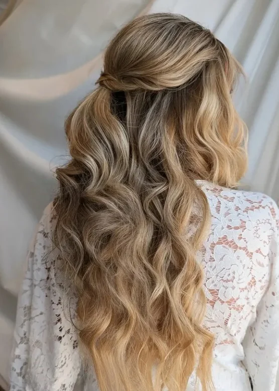 curly boho wedding hairstyle for beach bridal hair