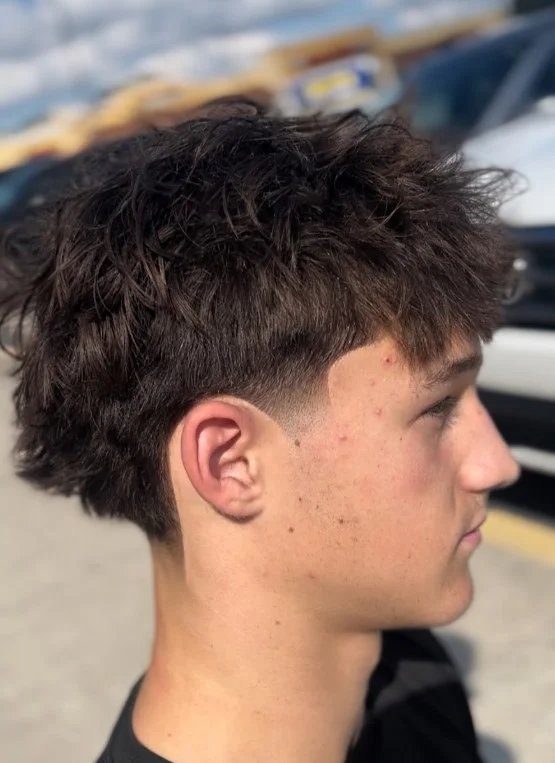 messy fringe beach hairstyle for men trendy hair look