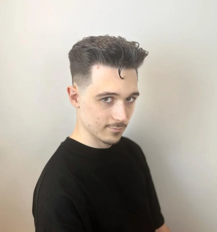 messy pompadour beach hairstyle for guys trendy style