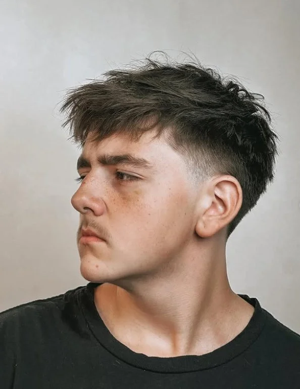 textured crop beach hairstyle for men short hair