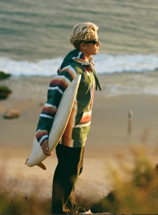 blonde surfer haircut for men beach hairstyle
