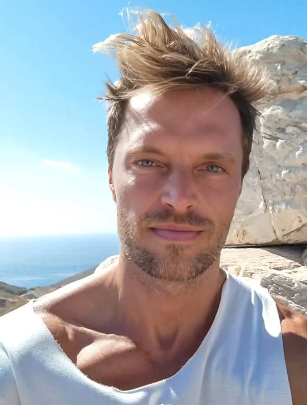 windswept beach hairstyle for men relaxed summer look