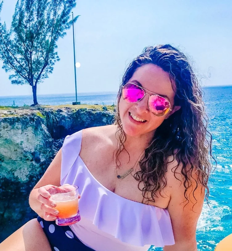 Curly beach party hairstyle with natural volume and soft summer curls