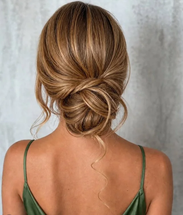 beachy chignon hairstyle for elegant beach wedding hair