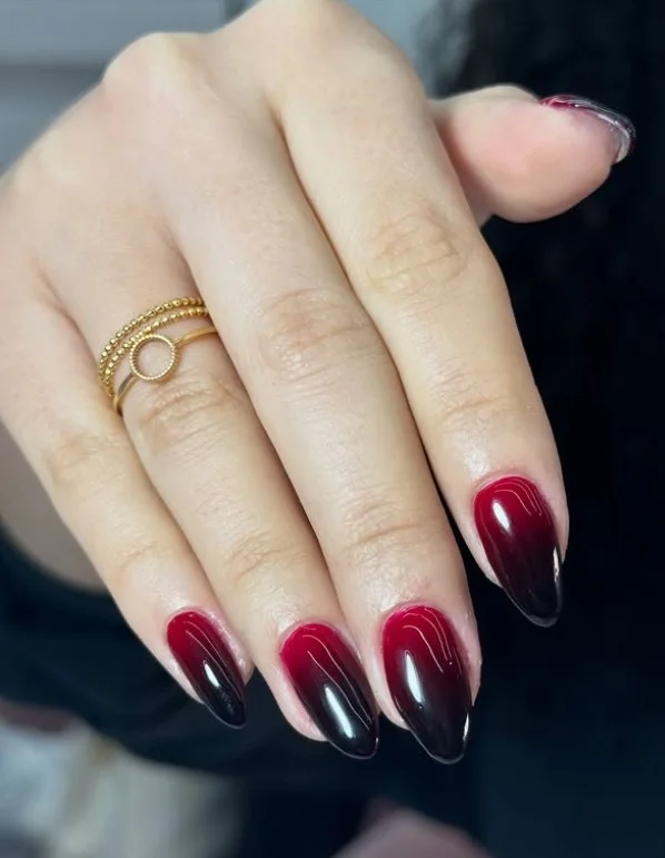 black and burgundy ombre almond nails elegant design