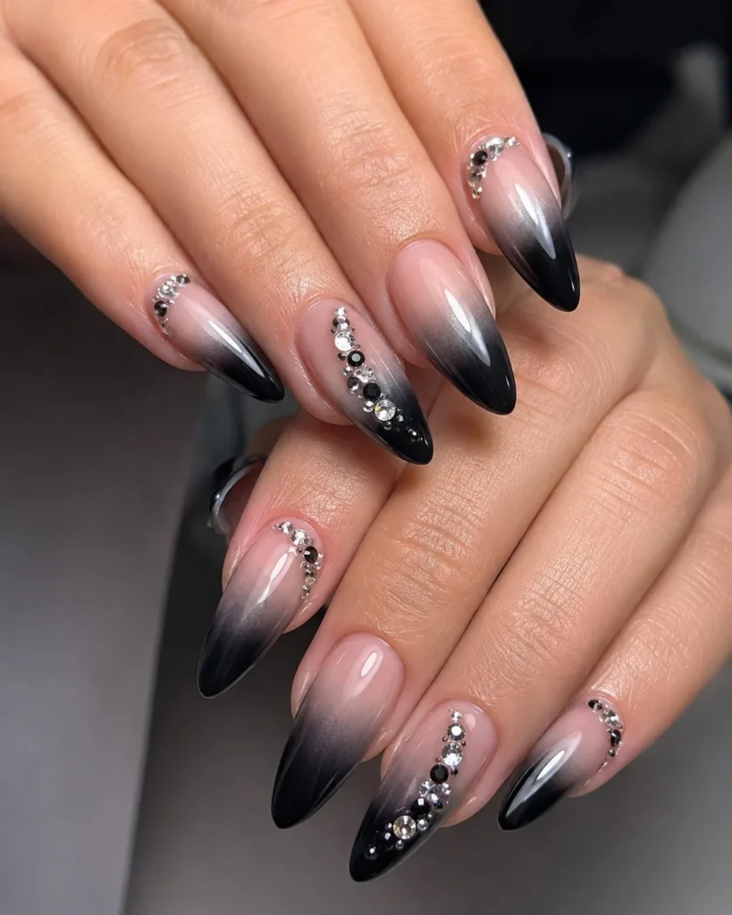black ombre almond nails with rhinestones luxury design
