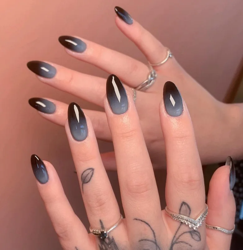 black to gray ombre almond nails modern fade look