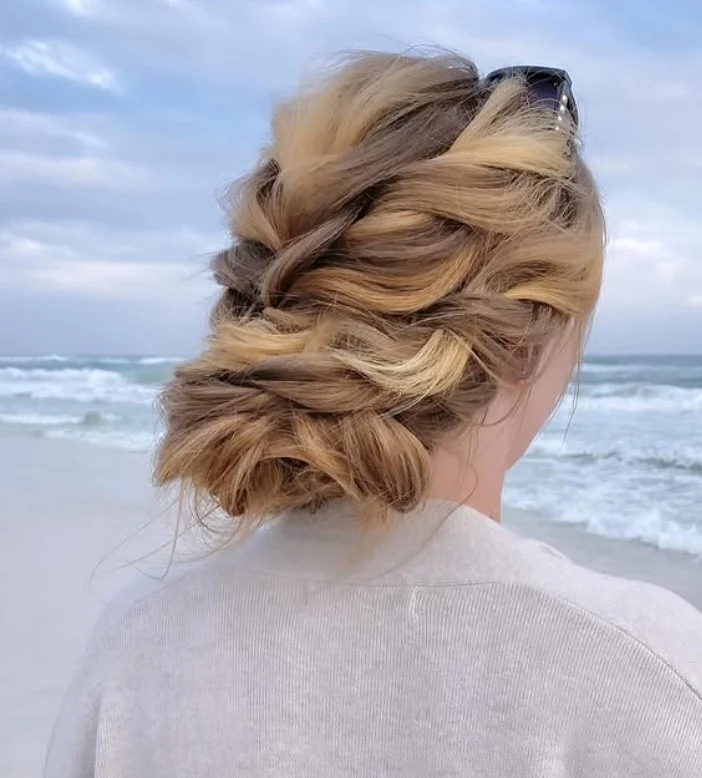 boho beach updo hairstyle with relaxed messy texture