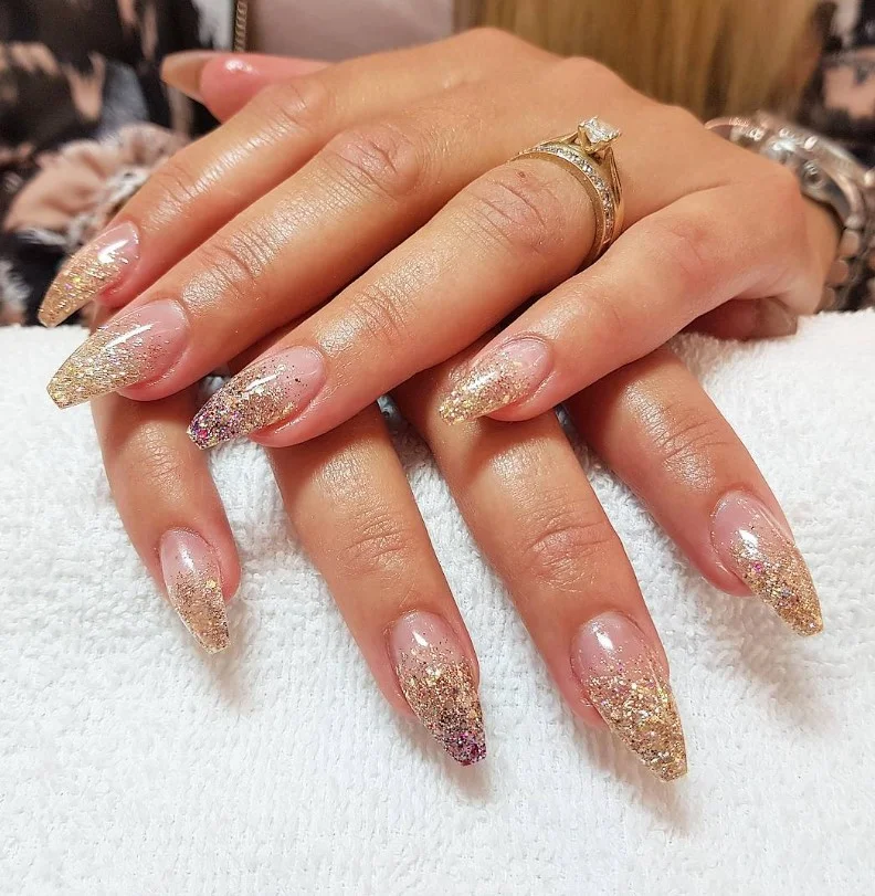 champagne glitter almond nails classy shimmer look