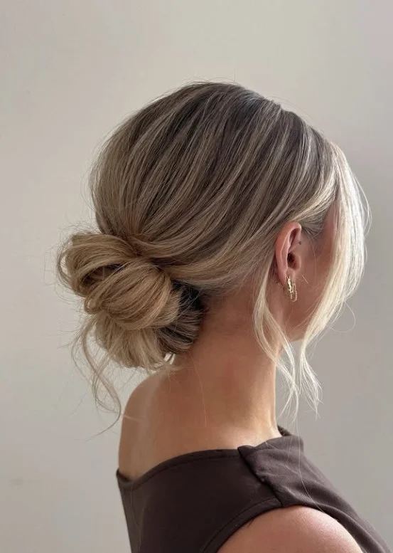 low knot medium hair beach hairstyle relaxed style