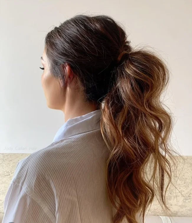 textured ponytail medium hair beach hairstyle volume look