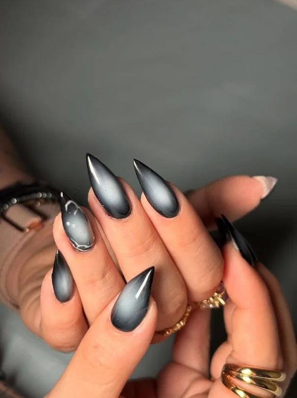 glossy black fade almond nails shiny nail look