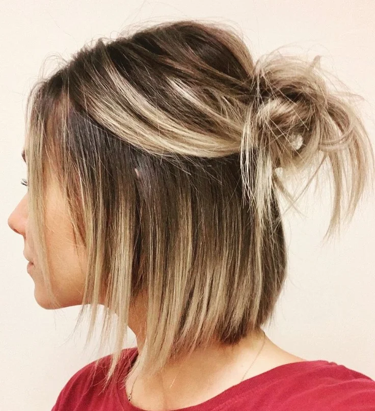 half up beach updo hairstyle with loose waves