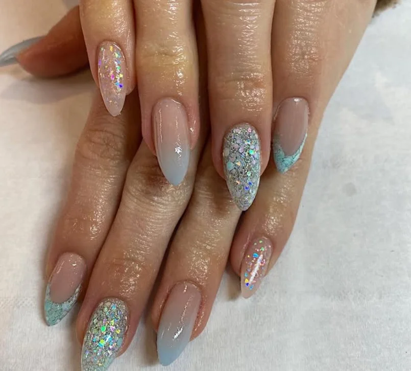 ice blue glitter fade almond nails winter inspired look