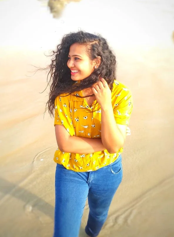 side swept long curly beach hairstyle with volume