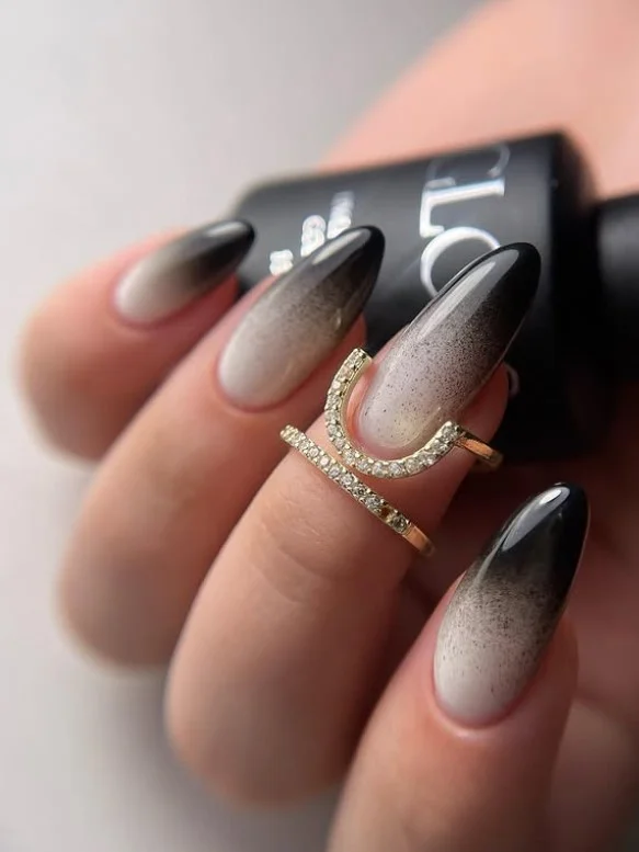 milky black ombre almond nails soft faded style