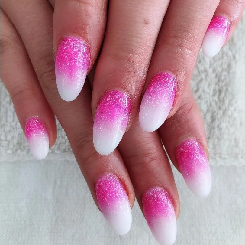 hot pink glitter fade almond nails glamorous look