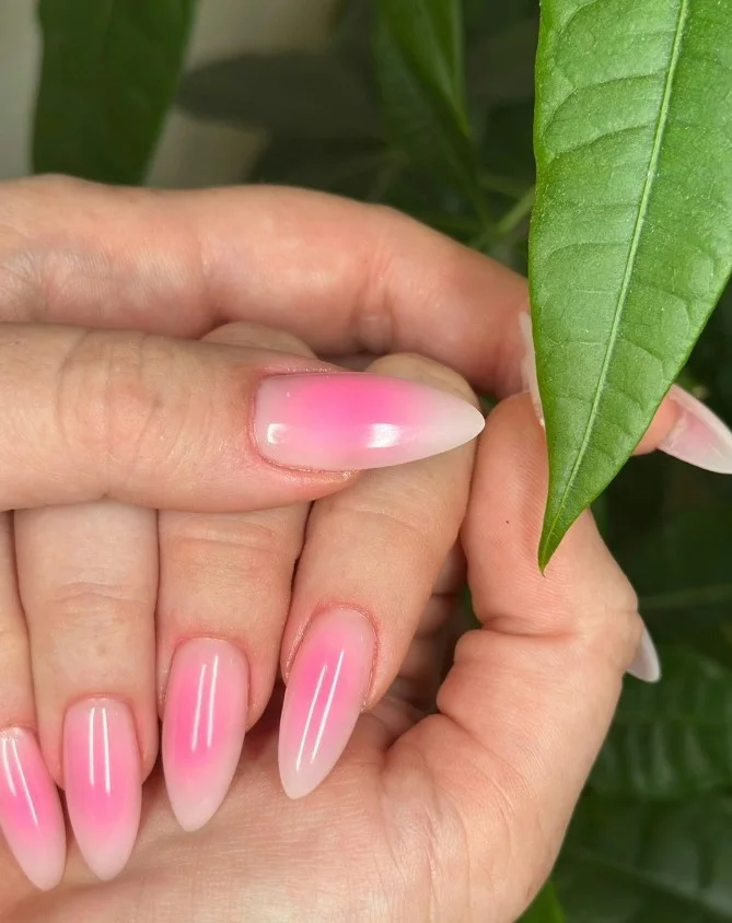 pink pearl glow ombre almond nails elegant finish