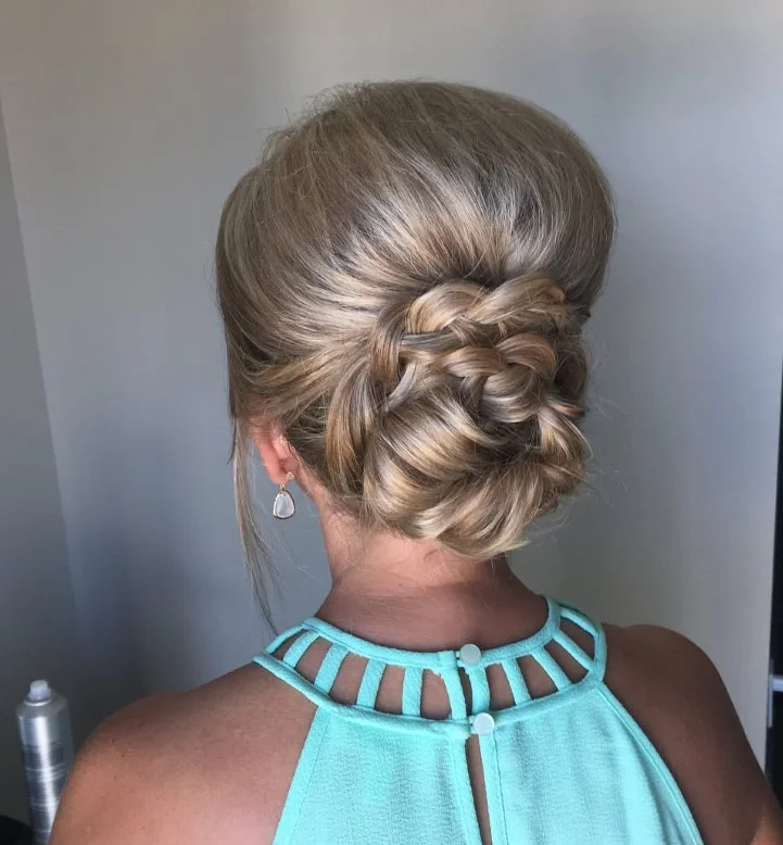 twisted low beach hairstyle with elegant soft texture
