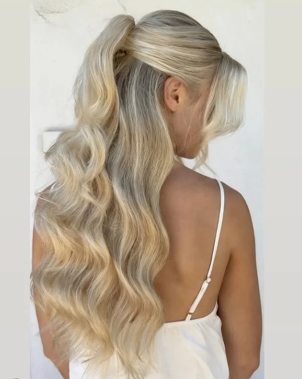 balayage beach waves hairstyle for long hair with sun kissed highlights