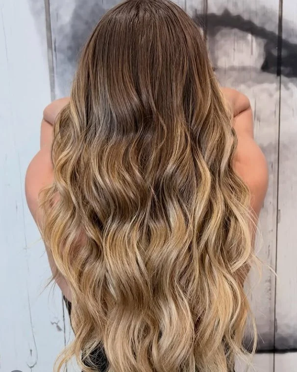 long hair beach waves hairstyle with sun kissed texture and natural summer volume