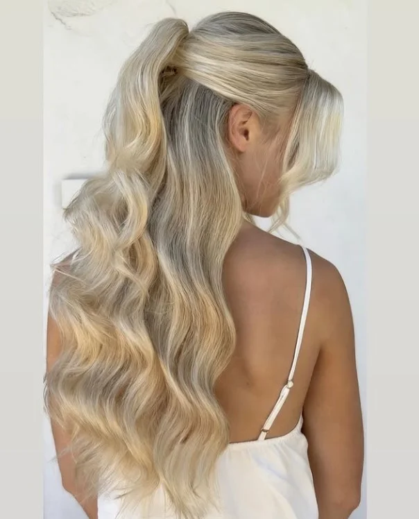 balayage beach waves hairstyle with dimensional highlighted hair