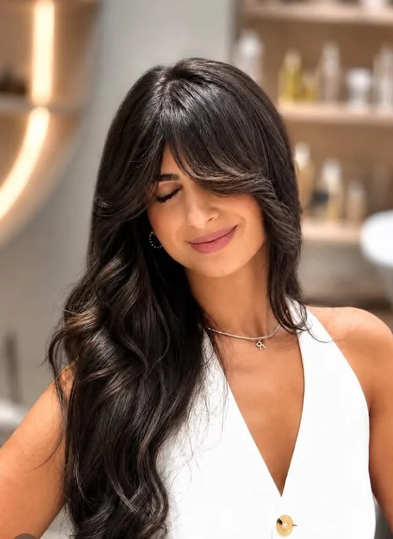 beach waves hairstyle with face framing layers and soft texture