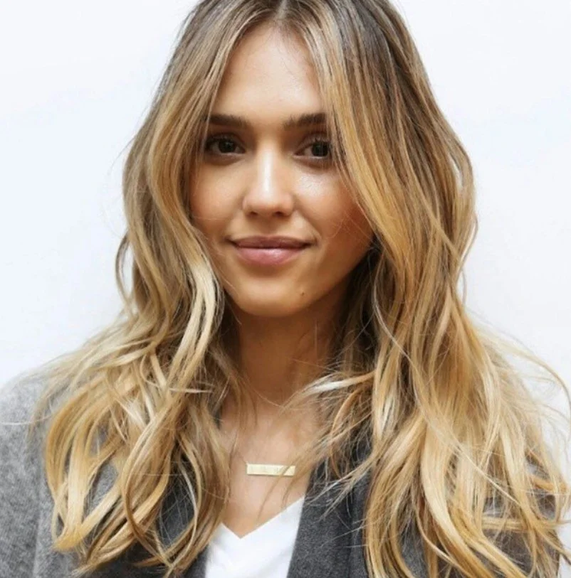 soft blonde beach waves hairstyle with natural summer texture