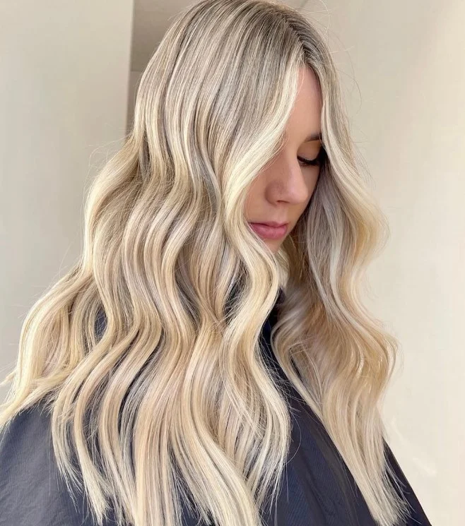 voluminous beach waves hairstyle with full body and movement