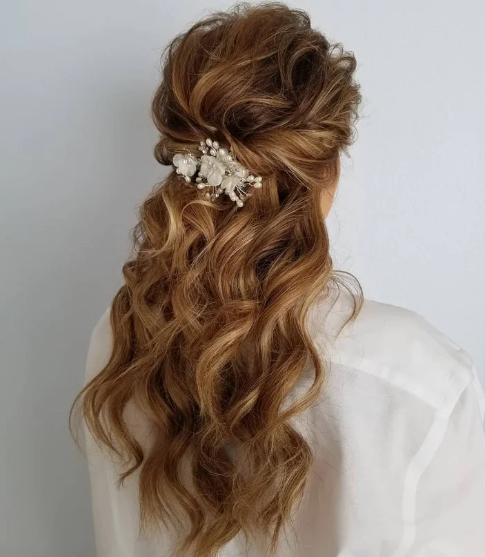 beach waves wedding hairstyle featuring crystal bridal hair accessories