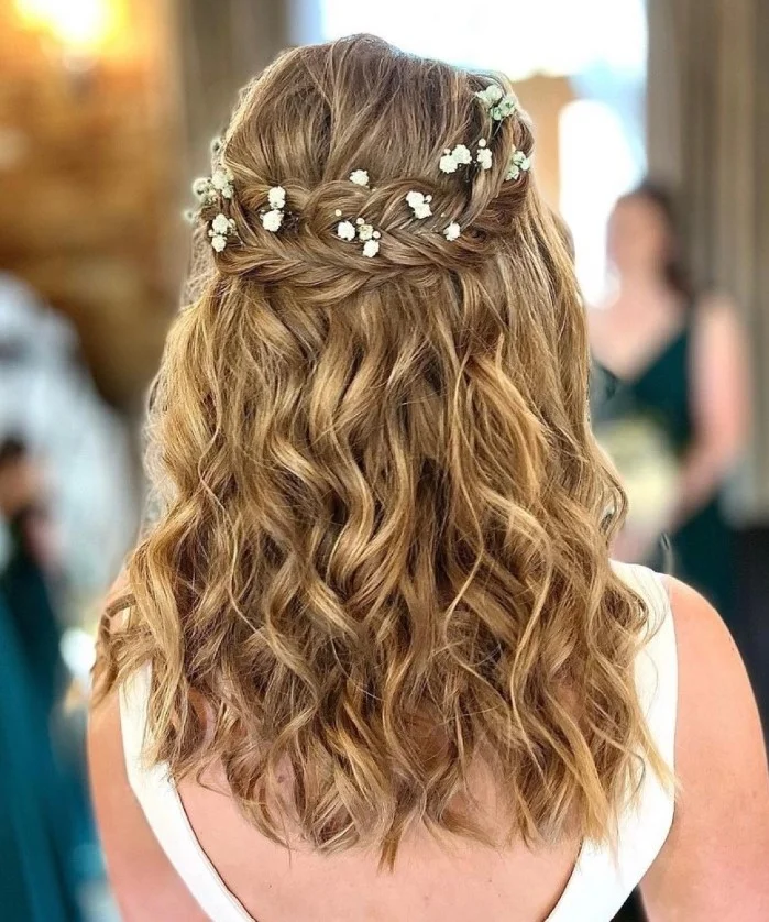 beach waves wedding hairstyle with floral crown and romantic texture
