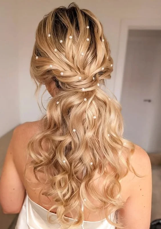 pearl adorned beach waves hairstyle for elegant bridal wedding hair