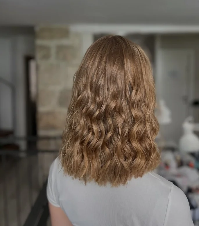 classic shoulder length beach waves hairstyle with soft texture and volume